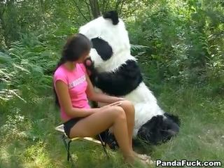 X rated movie in the woods with a huge toy panda